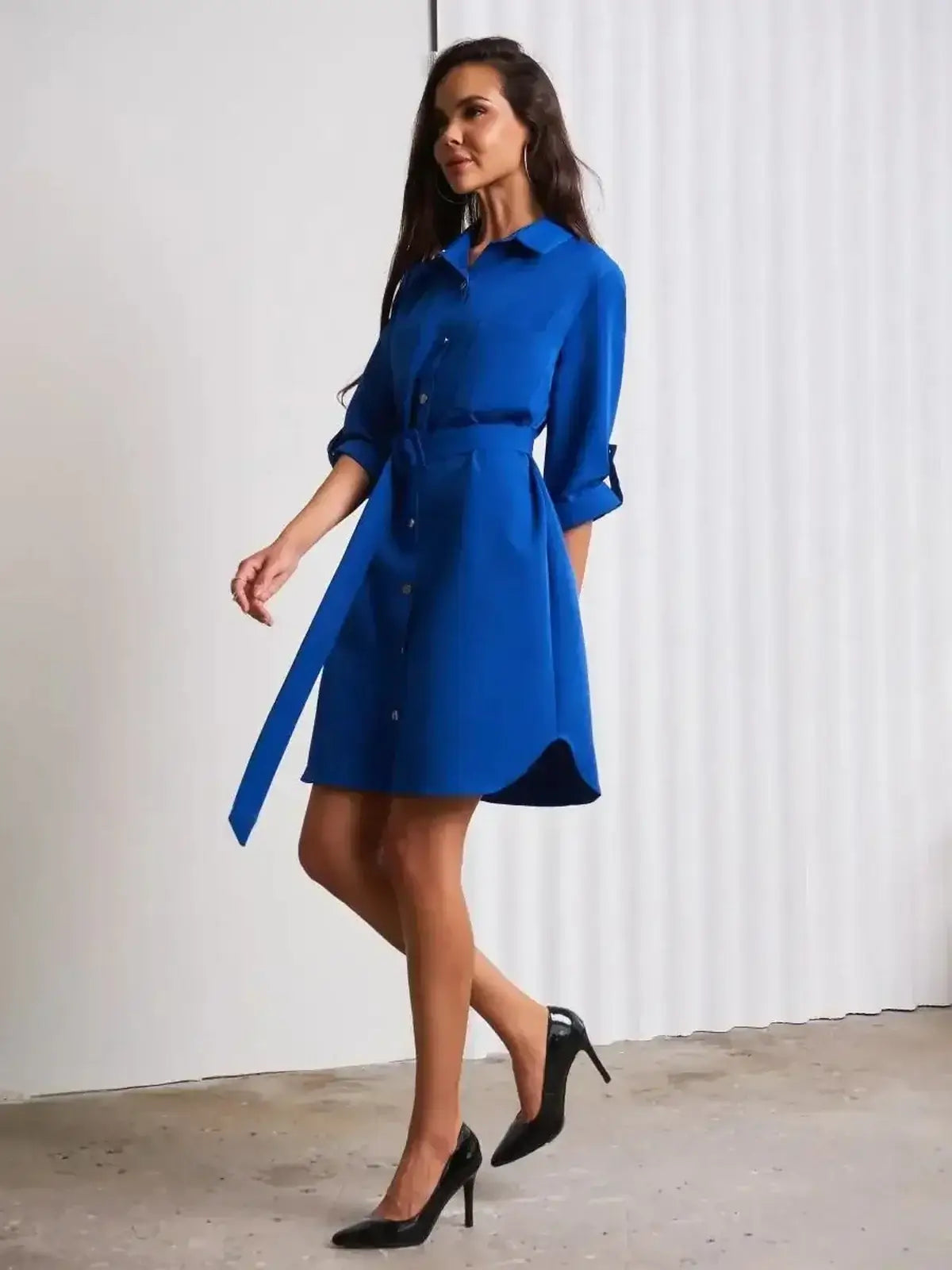 Cobalt Charm Mini Dress by Lauven, showcasing a structured silhouette with a waist belt and vibrant blue color.