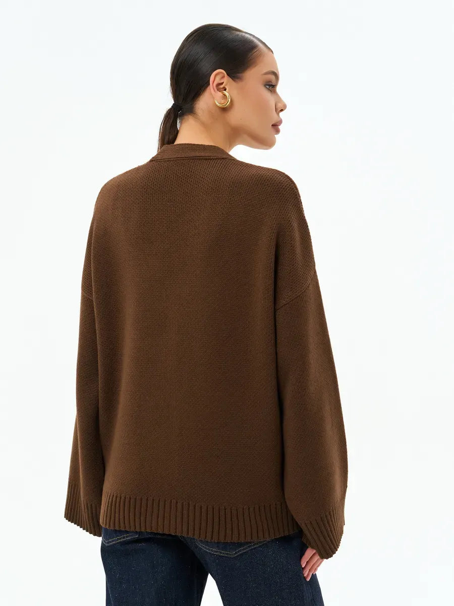 Cocoa Cardigan by Lauven worn by a model, showcasing its warm oversized knitwear design in chocolate brown.