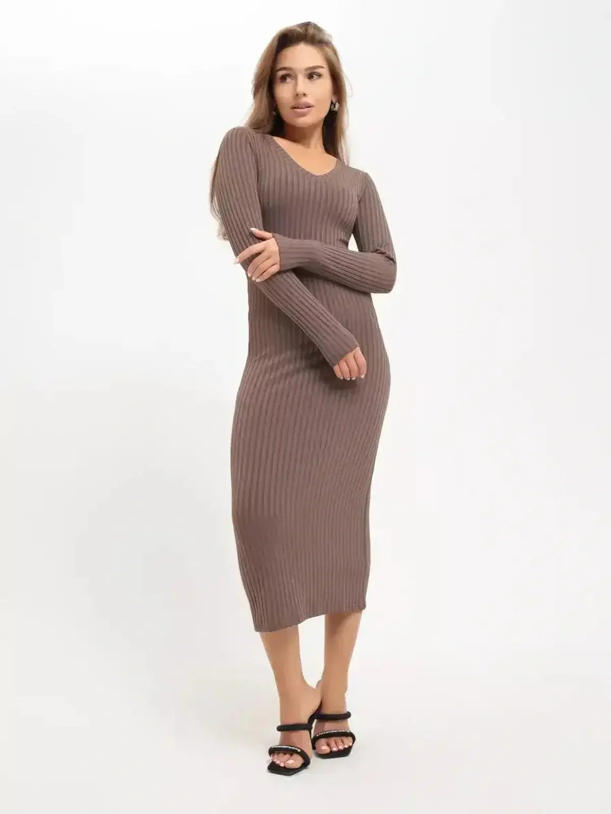 Model wearing the Lauven Contour Midi Dress, showcasing sleek ribbed elegance and a sculpted fit.