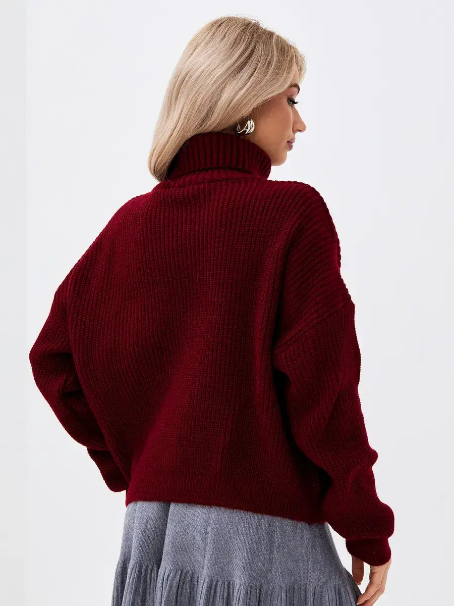 Crimson Pullover by Lauven – Oversized burgundy knit sweater with high neck for a cozy, stylish look.