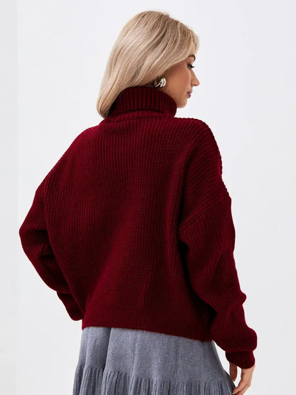 Crimson Pullover by Lauven – Oversized burgundy knit sweater with high neck for a cozy, stylish look.
