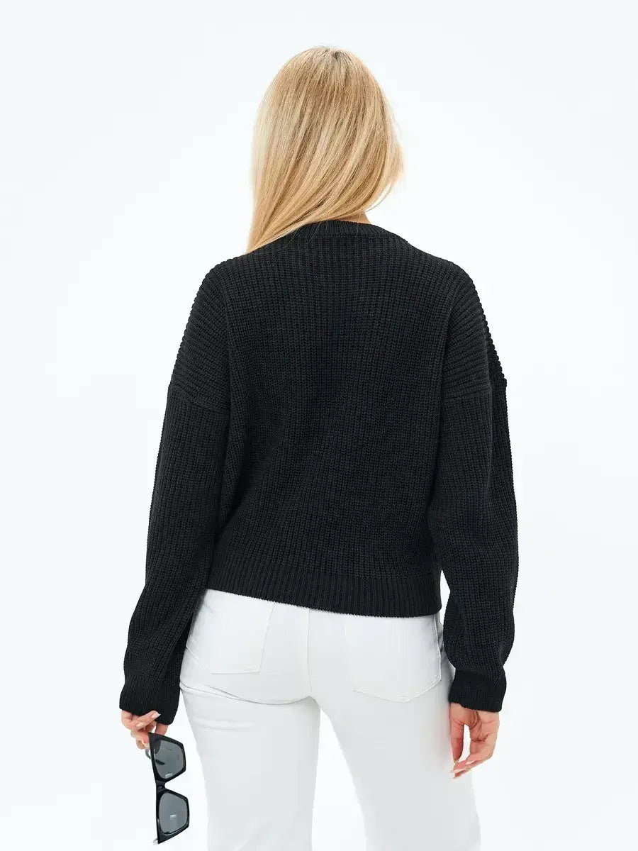 Eclipse Sweater by Lauven, oversized knit in classic black, showcasing a relaxed fit and cozy design.