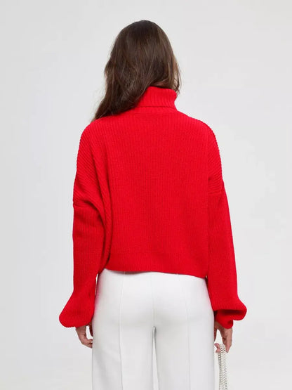 Ember Pullover by Lauven, oversized red knit sweater with a high neck, showcasing a cozy and stylish design.