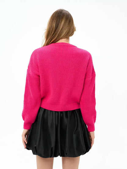Flamingo Sweater by Lauven, oversized knit in bold fuchsia, showcasing a cozy design and perfect fit for stylish layering.