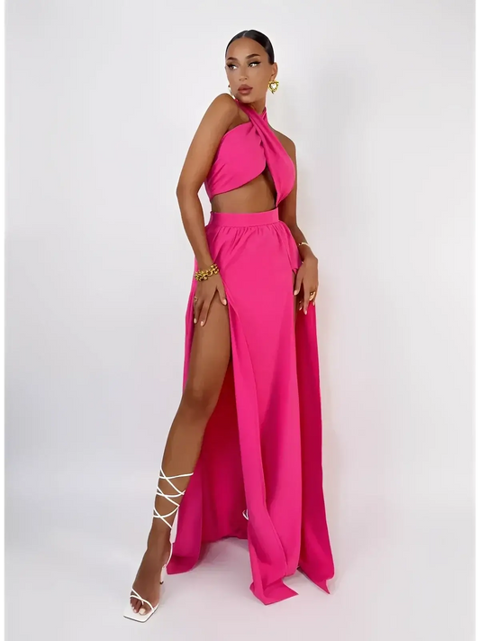 Fuchsia Breeze Set by Lauven featuring criss-cross top and flowing skirt, ideal for beach strolls and soirées.