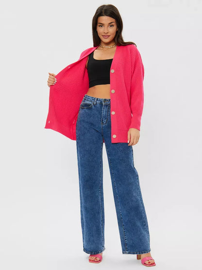 Fuchsia Cardigan by Lauven: Oversized wool blend knitwear in bright pink, styled with wide jeans.