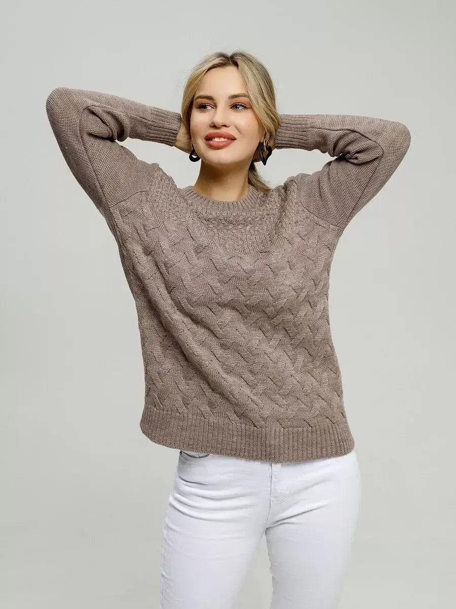 Model wearing the Gaia Sweater by Lauven in warm brown, showcasing cozy knitwear style and breathable comfort.