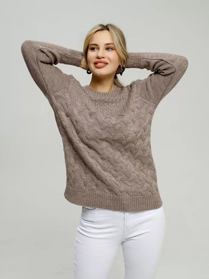 Model wearing the Gaia Sweater by Lauven in warm brown, showcasing cozy knitwear style and breathable comfort.