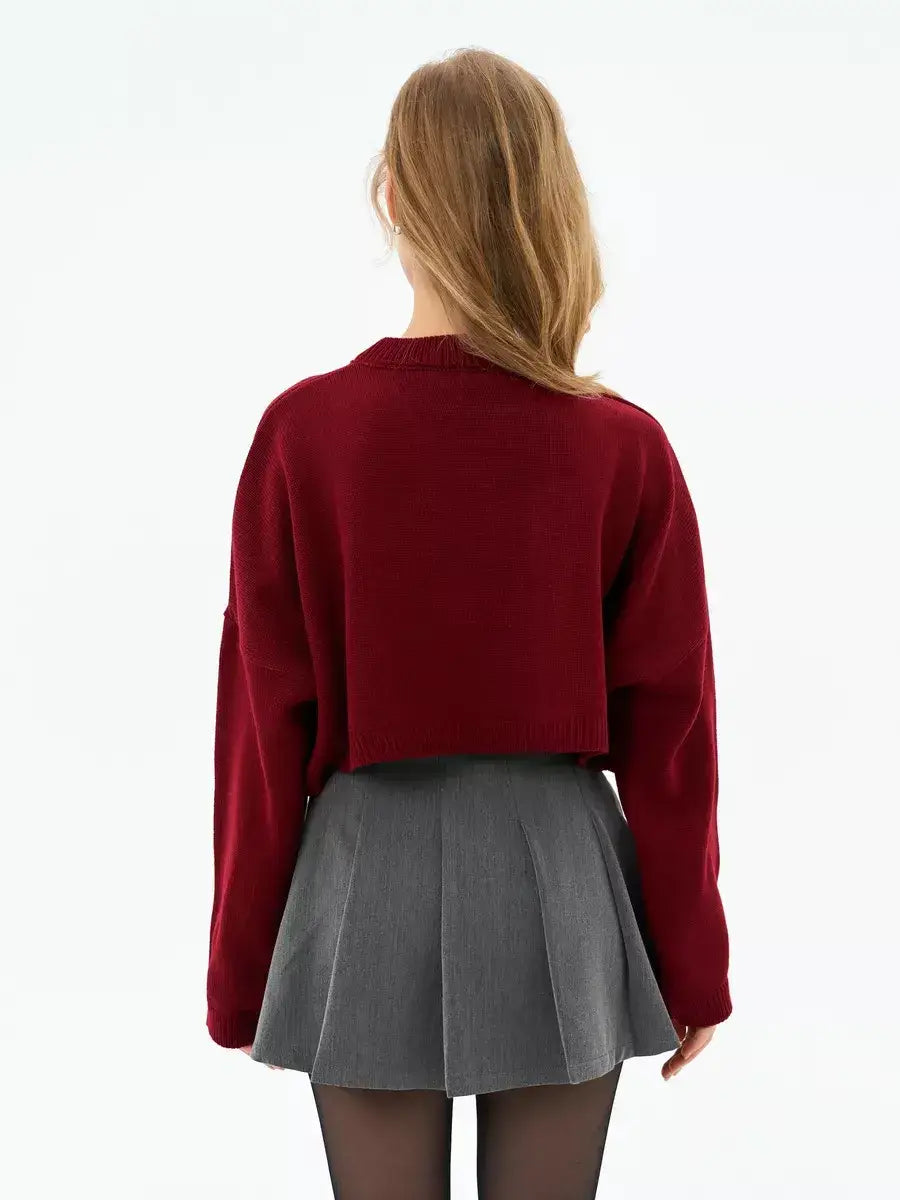 Back view of the Garnet Sweater by Lauven, a cropped oversized knit in deep burgundy.