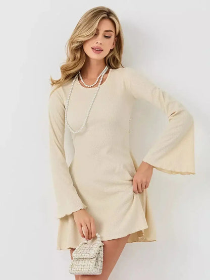 Ivory Flare mini dress by Lauven featuring long bell sleeves and a flattering silhouette.