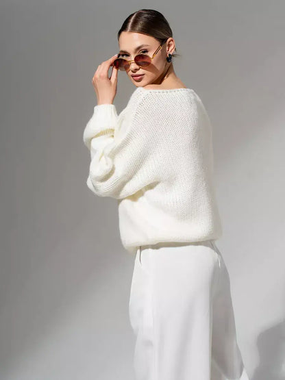 Ivory Sweater by Lauven, oversized off-shoulder knit in crisp white, providing elegance and comfort.