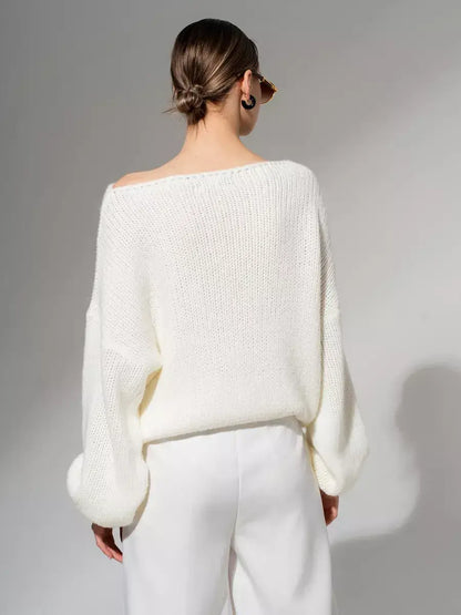 Ivory Sweater from Lauven - Oversized off-shoulder knit in crisp white, showcasing a minimalist design.
