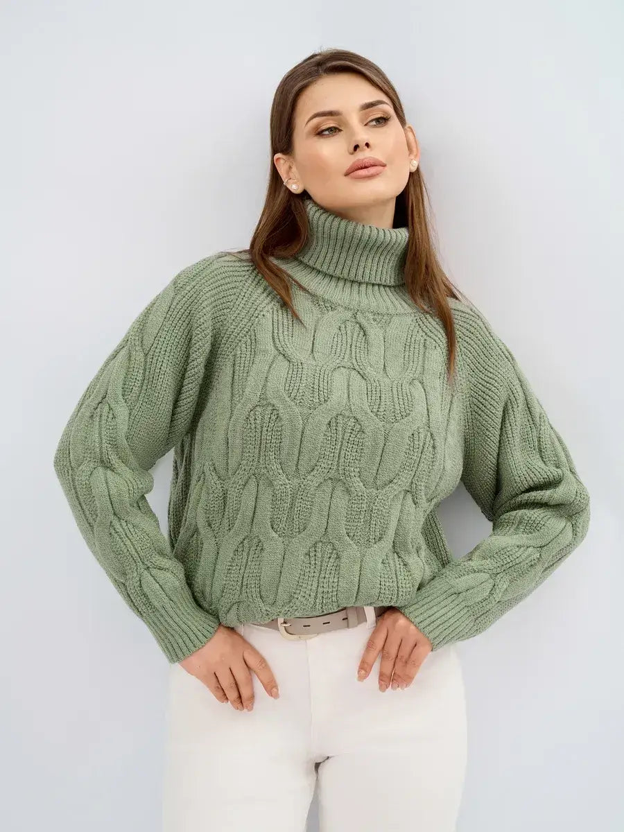 Ivy Sweater by Lauven in oversized cable knit with high neck, perfect for elegant comfort in colder months.