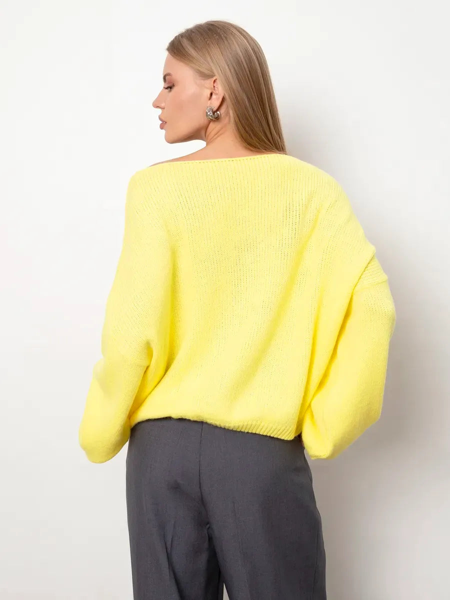 Lemonade Sweater by Lauven, an oversized women's knit sweater in bright yellow with a boat neck design.