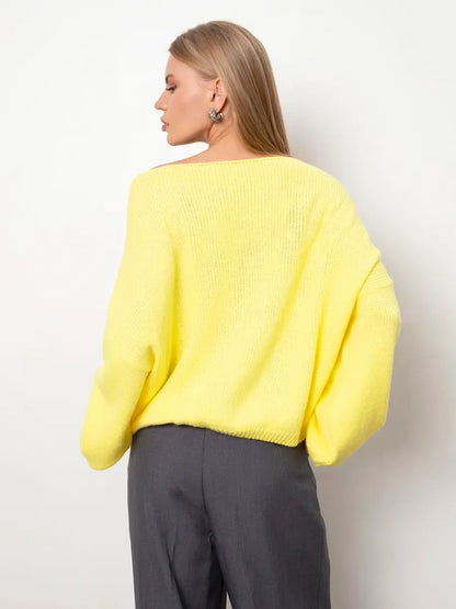 Lemonade Sweater by Lauven, an oversized women's knit sweater in bright yellow with a boat neck design.