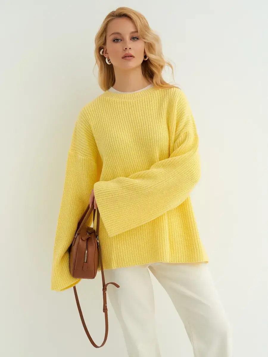 Lemonade Sweater by Lauven featuring an oversized knit in soft lemon yellow, perfect for a stylish and comfortable look.