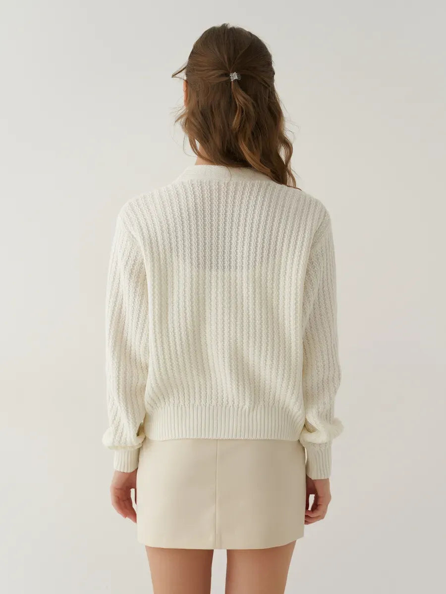 Luna Cardigan by Lauven, oversized cropped knitwear in cream, showcasing the back view on a model.