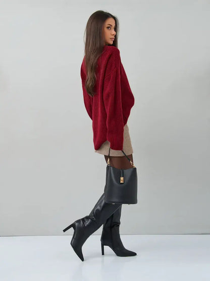 Maribel Sweater by Lauven - Oversized burgundy knit pullover styled with a skirt and knee-high boots.