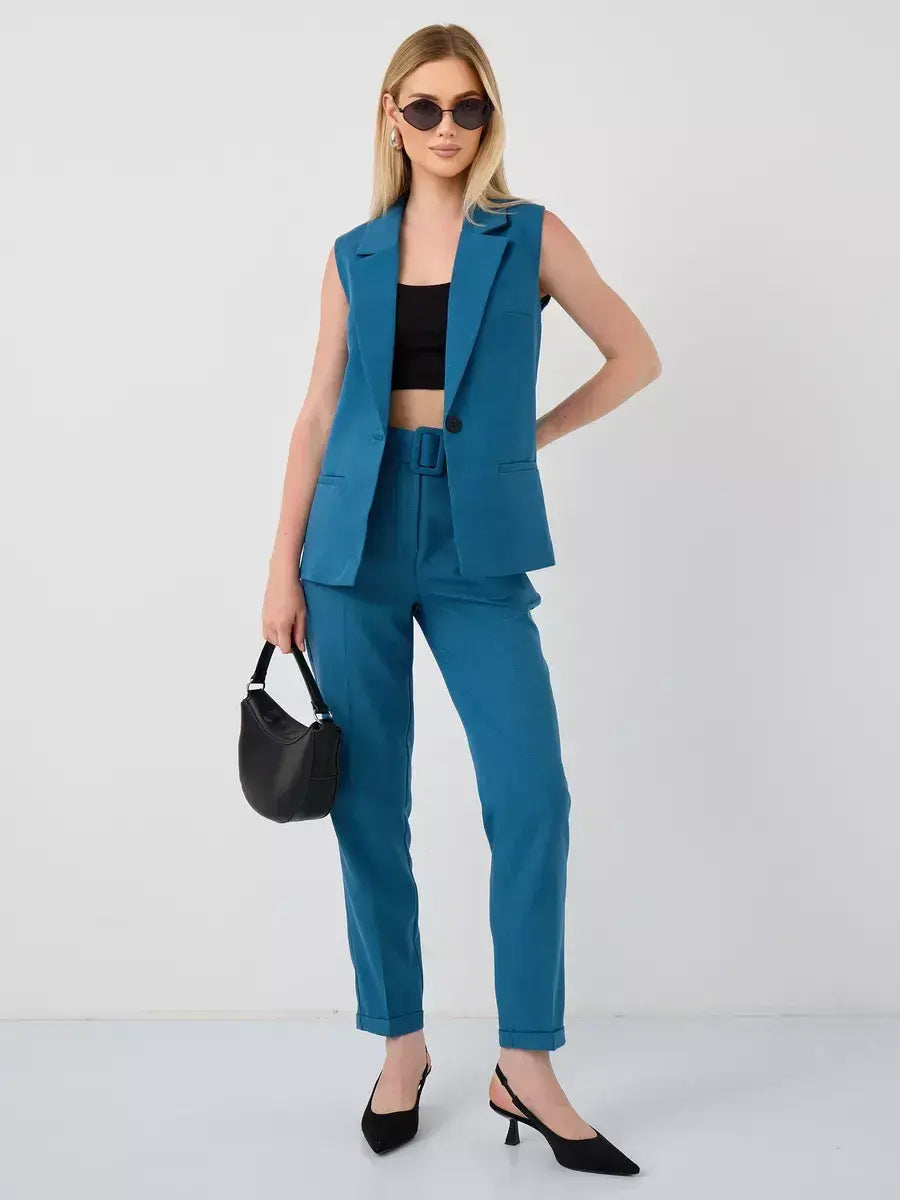 Marine Suit Set by Lauven – Stylish sleeveless teal vest and high-waist pants ensemble for modern women.