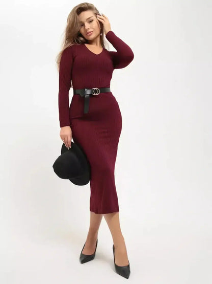 Model wearing the Merlot Grace Midi Dress by Lauven, showcasing a sleek design in deep burgundy with a trendy belt and hat.