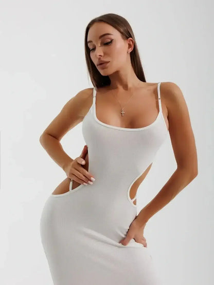 Model showcasing the Midi Dress Cutout Muse by Lauven, featuring alluring side cutouts and a sleek silhouette.