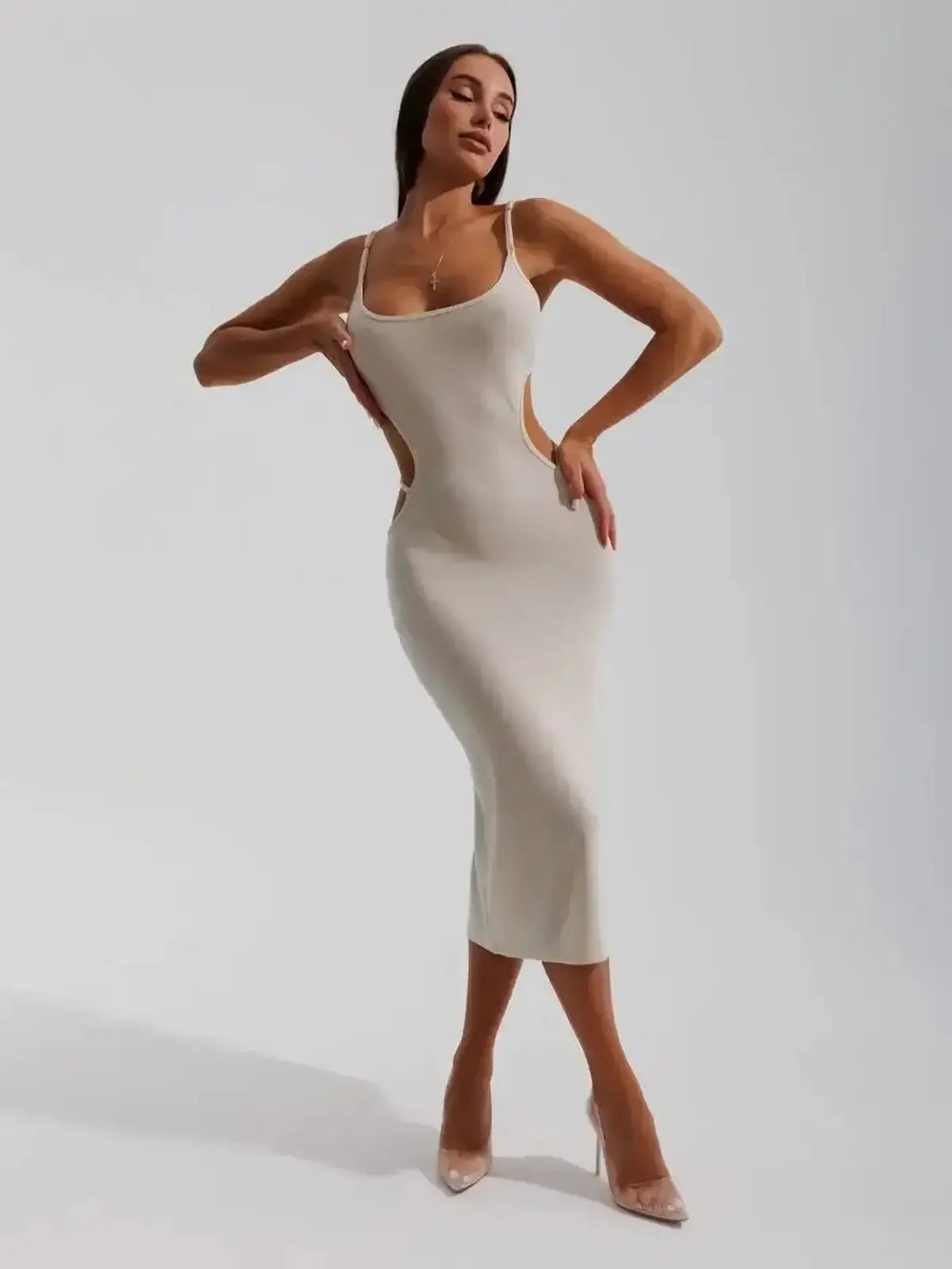 Midi Dress Seraphine by Lauven showcasing sculpted elegance with side cutouts in beige ribbed knit.