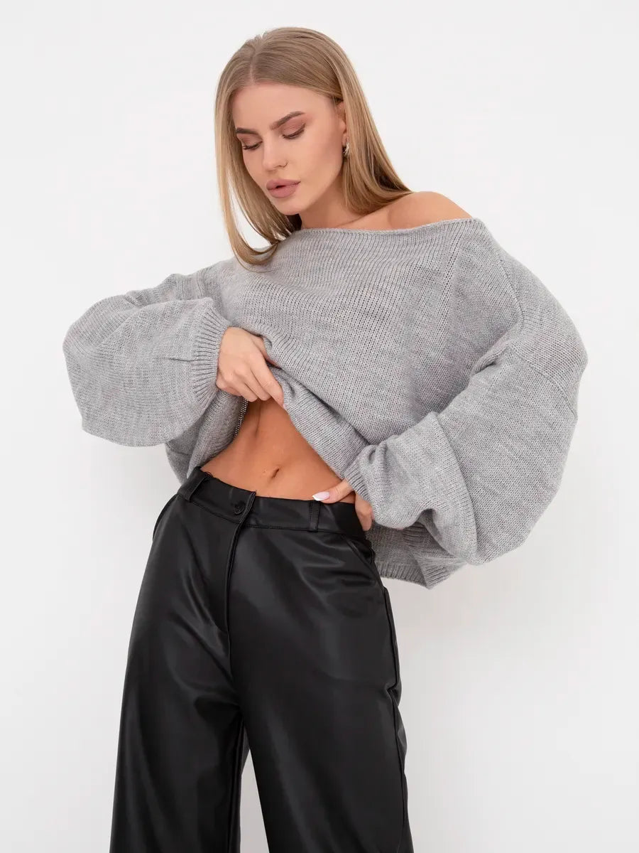 Mist Sweater by Lauven - Oversized knit sweater with boat neck in soft grey worn with black pants.