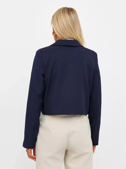 Back view of Lauven Navy Blazer showcasing its cropped tailored design, ideal for versatile and elegant styling.