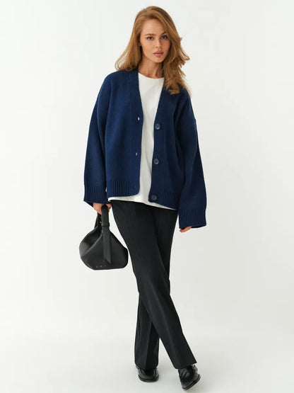 Navy Cardigan from Lauven, cozy oversized knitwear with button closure, styled with casual outfit.