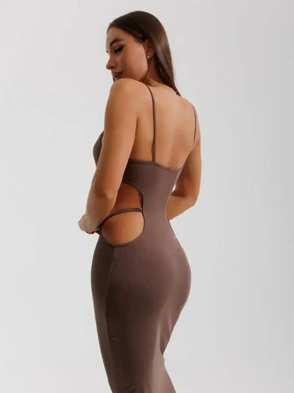 Obsidian Curve Midi Dress by Lauven showcasing a model with daring side cut-outs and slim straps.