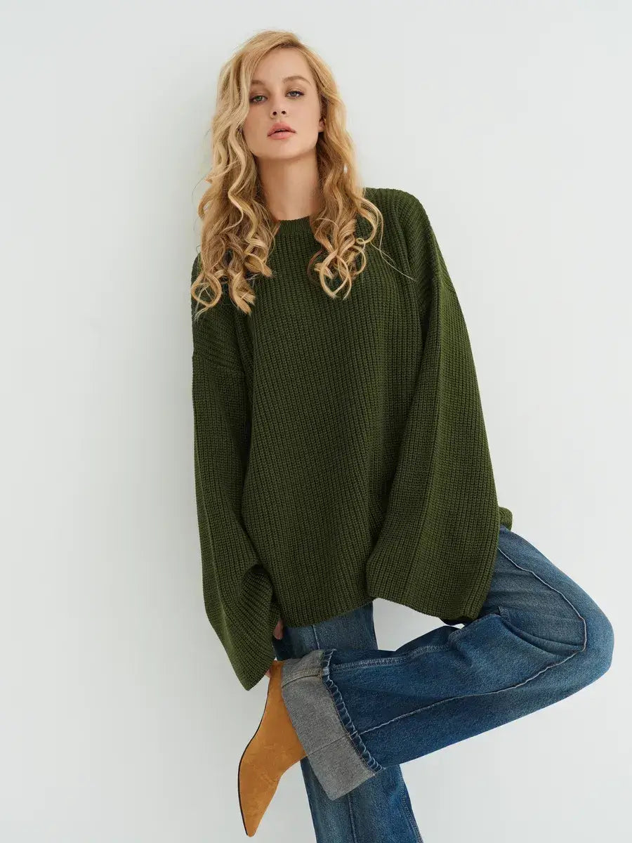 Olive Sweater by Lauven in deep khaki, oversized knit style, featuring relaxed wide sleeves and cozy ribbed texture.