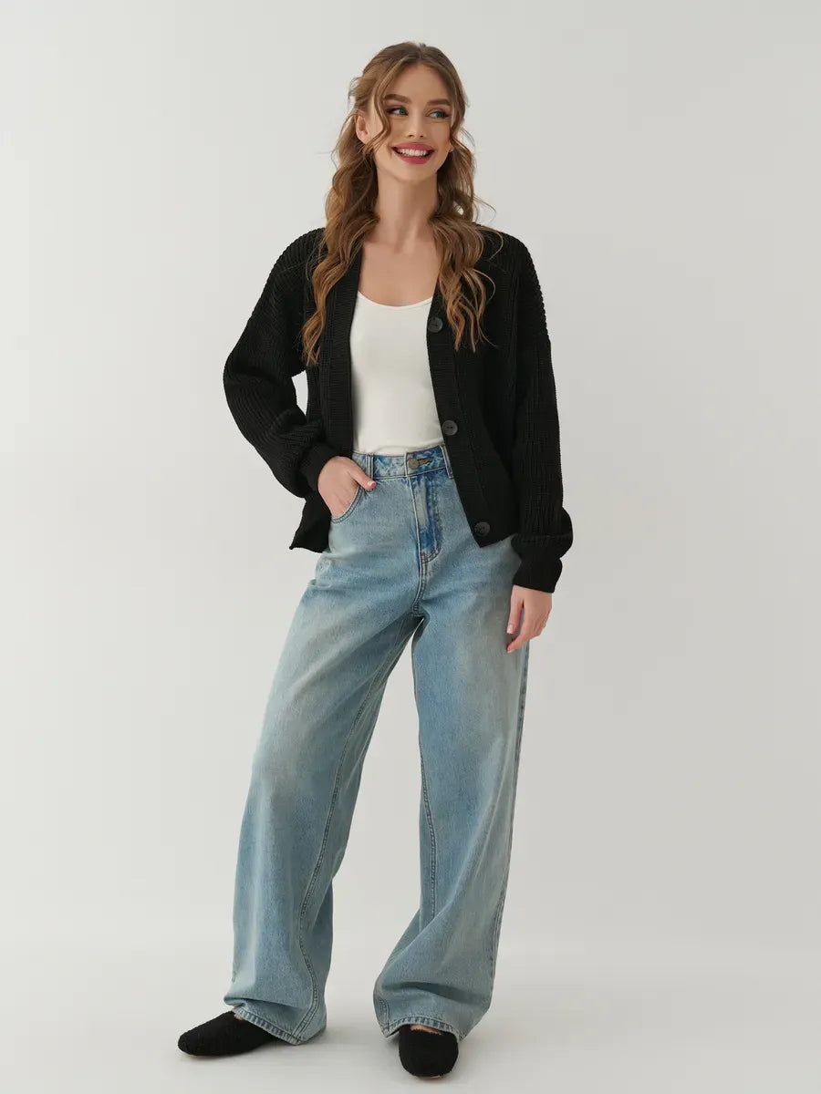 Onyx Cardigan from Lauven - Stylish oversized knitwear paired with jeans for a chic look.