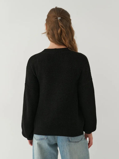 Onyx Cardigan by Lauven – Back view of an elegant oversized black knit cardigan.