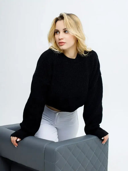 Onyx Pullover by Lauven: Lightweight cropped knit in deep indigo worn casually with modern styling.