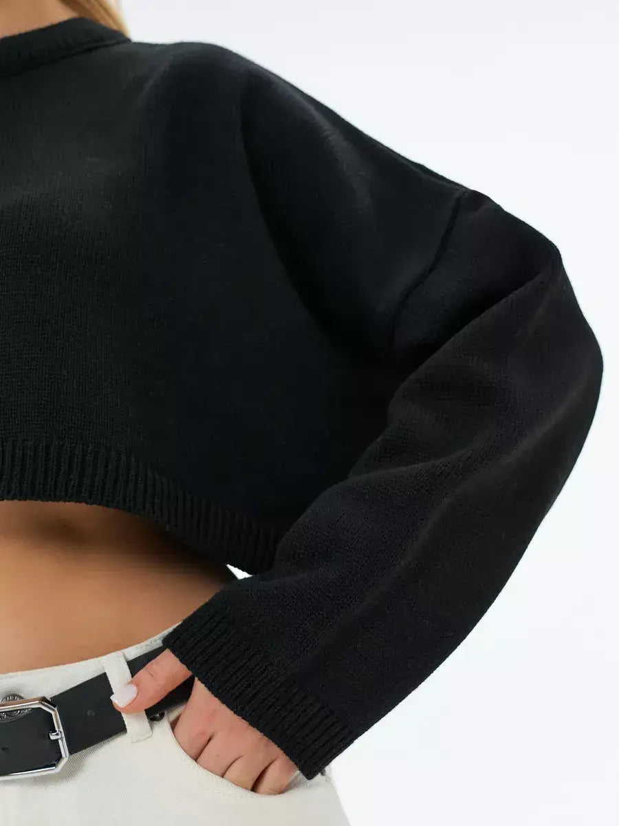 Onyx Sweater by Lauven, cropped oversized knit in black, perfect for layering and modern minimalist style.