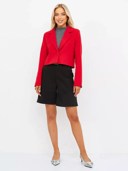Ruby Blazer by Lauven in vibrant red, showcasing a tailored cropped silhouette with black shorts.