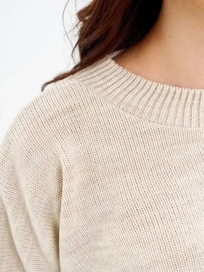 Cropped oversized knit Sand Sweater by Lauven in soft light beige color showcasing its breathable texture.