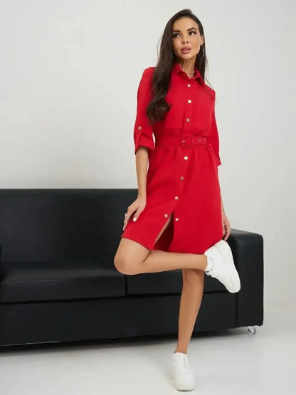 Model wearing the Scarlet Belted Mini dress by Lauven, showcasing its flattering fit and stylish design.