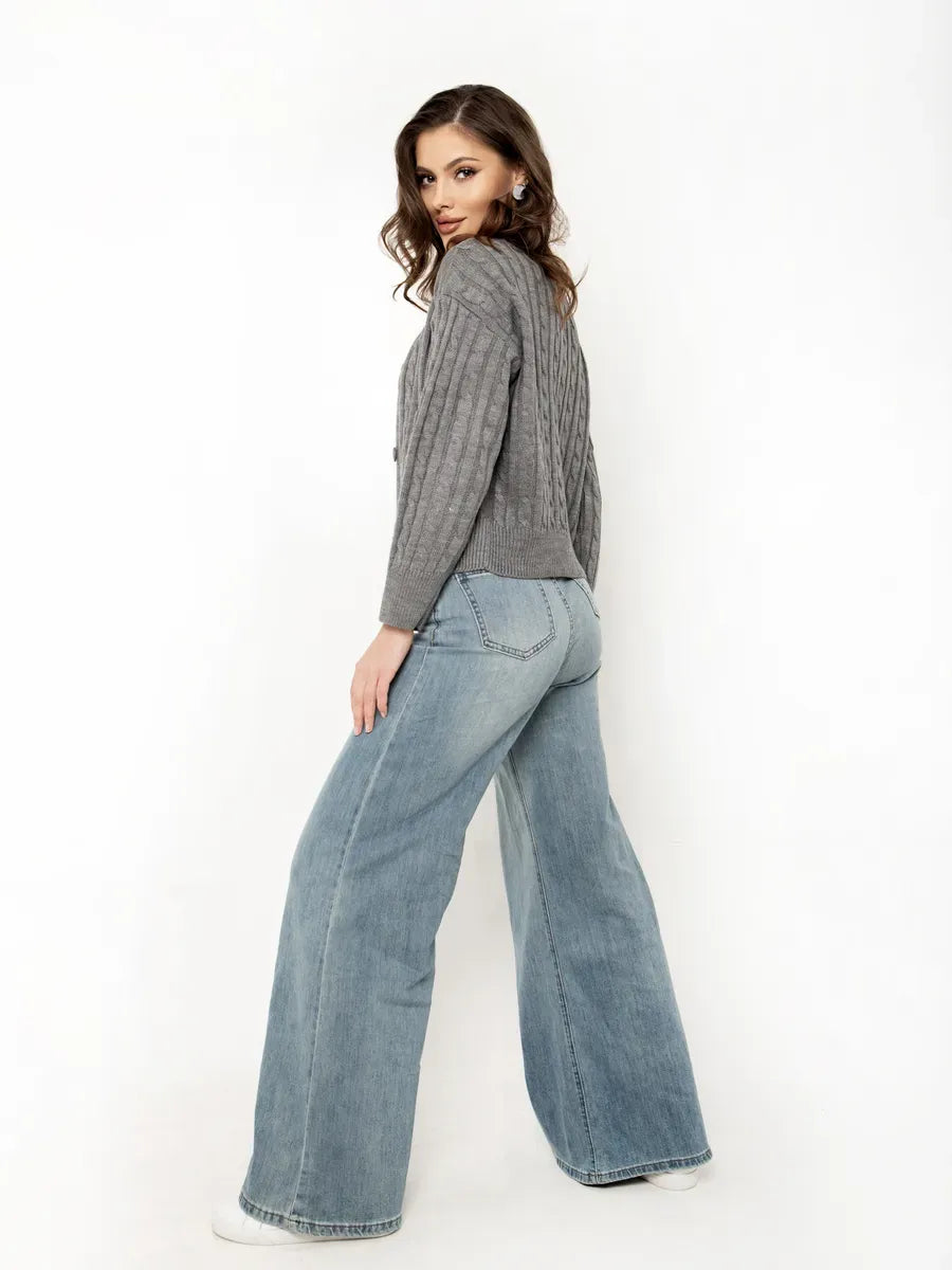 Selene Cardigan by Lauven, cropped gray knit with button closure, styled with wide-leg jeans for a chic look.