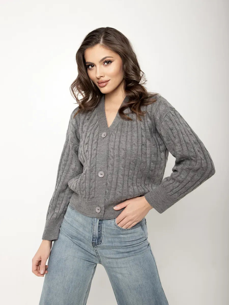 Selene Cardigan by Lauven, cropped gray knit with button closure, showcasing textured cable-knit pattern.