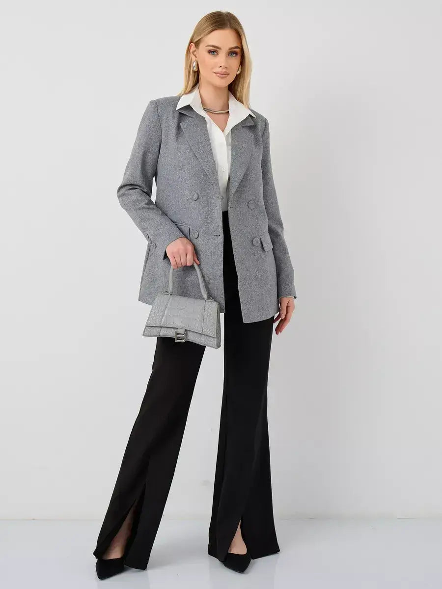 Silverstone Blazer by Lauven – Oversized double-breasted gray tailored jacket for women styled with black pants.