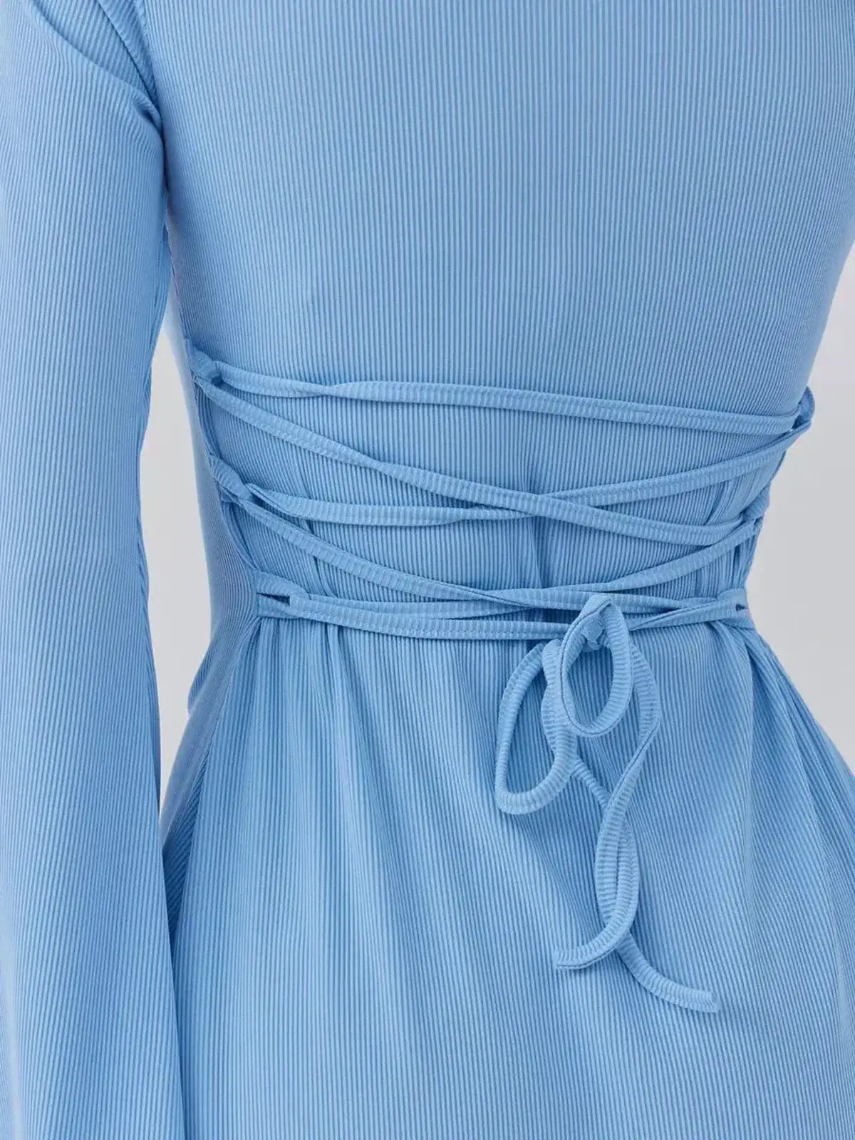 Skyline Cutout by Lauven showcasing the textured ribbed knit fabric and chic lace-up detail in sky blue.