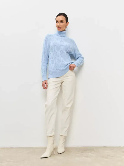 Skyline Knitwear by Lauven, women's pastel blue wool-blend turtleneck sweater with cable-knit design.