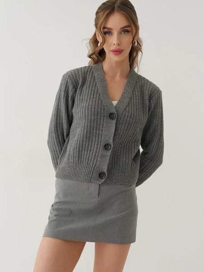 Slate Cardigan by Lauven — Gray oversized cropped knitwear with button-front closure, styled over a skirt.