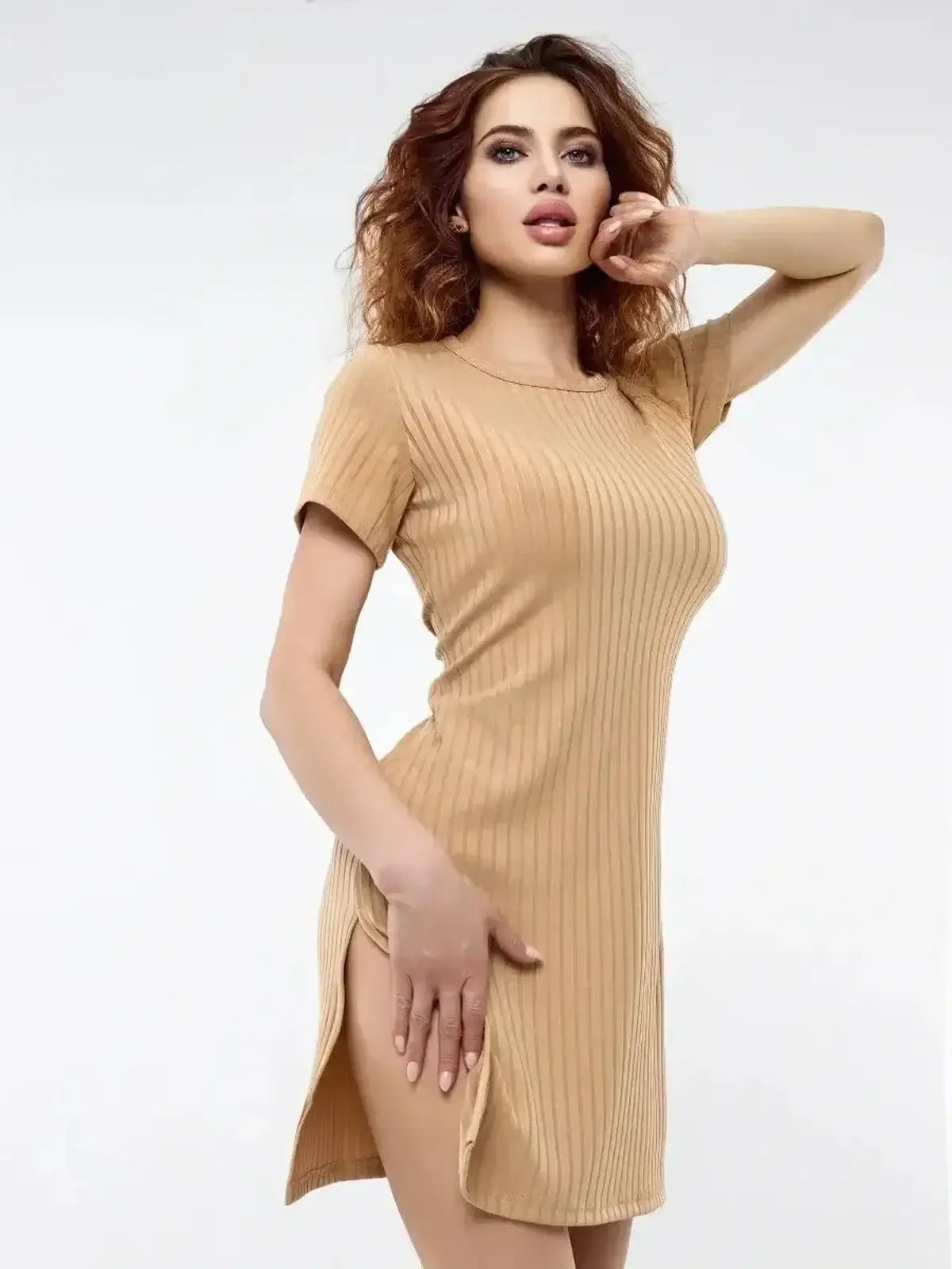 Model wearing Soft Edge mini dress by Lauven, featuring ribbed texture and side slits for summer style.