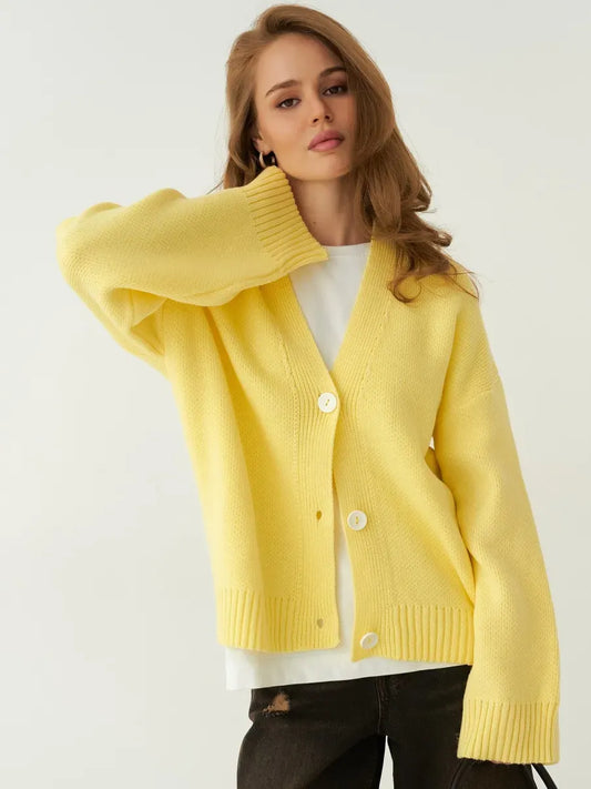 Sunny Cardigan by Lauven – Bright yellow oversized knitwear with button closure for a cozy stylish look.
