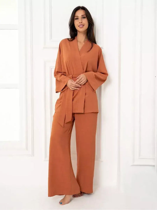 Elegant model wearing Lauven Terracotta Suit Set in warm brown, showcasing oversized style and comfort.