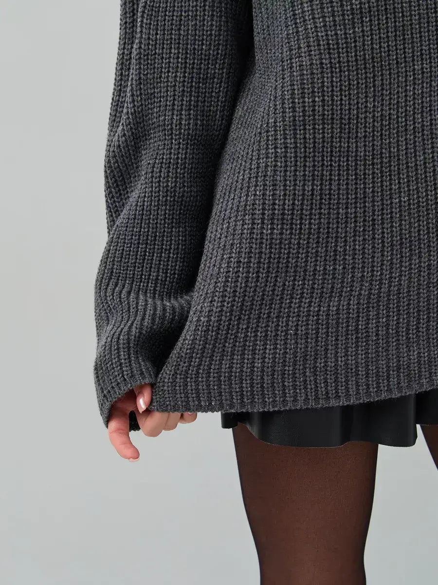 Vera Sweater by Lauven in dark gray knit, showcasing oversized design and chunky ribbed texture.