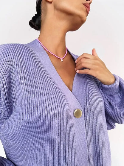 Lunaria Cardigan in soft lavender, showcasing oversized knit design and elegant longline silhouette by Lauven.
