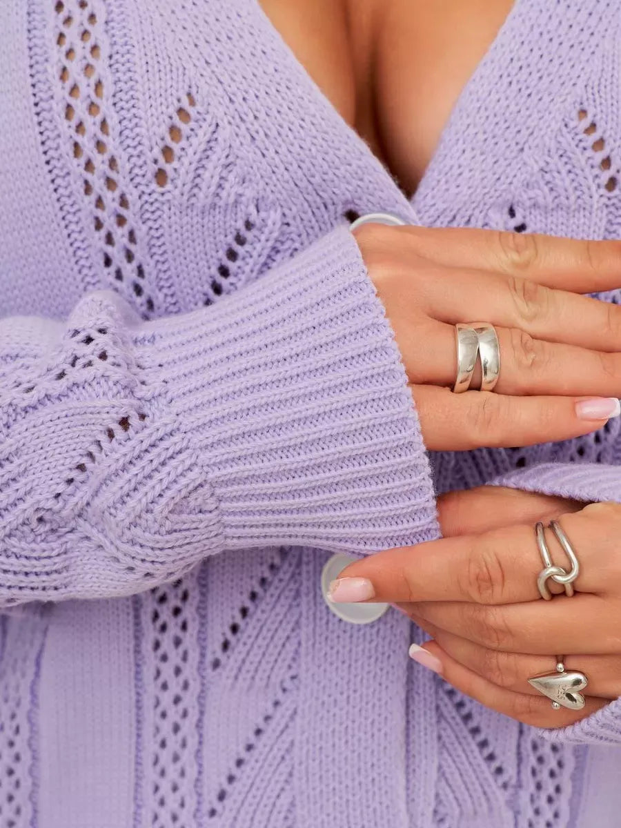 Lavina Cardigan by Lauven showcasing long lavender knit with ruffles and button closure.